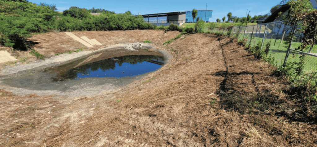 AQUALIS Careers - AQUALIS soil erosion of a retention pond